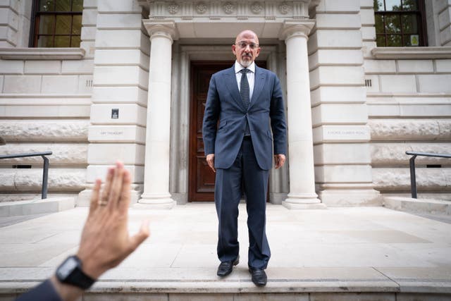Chancellor Nadhim Zahawi outside HM Treasury in Westminster when he was chancellor (PA)