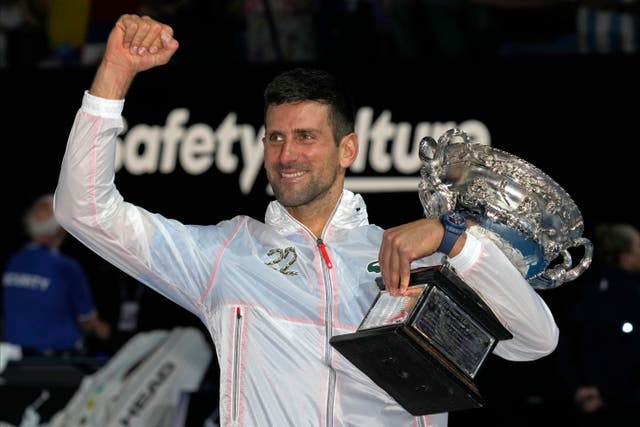 Novak Djokovic celebrates his 10th Australian Open title (Dita Alangkara/AP)