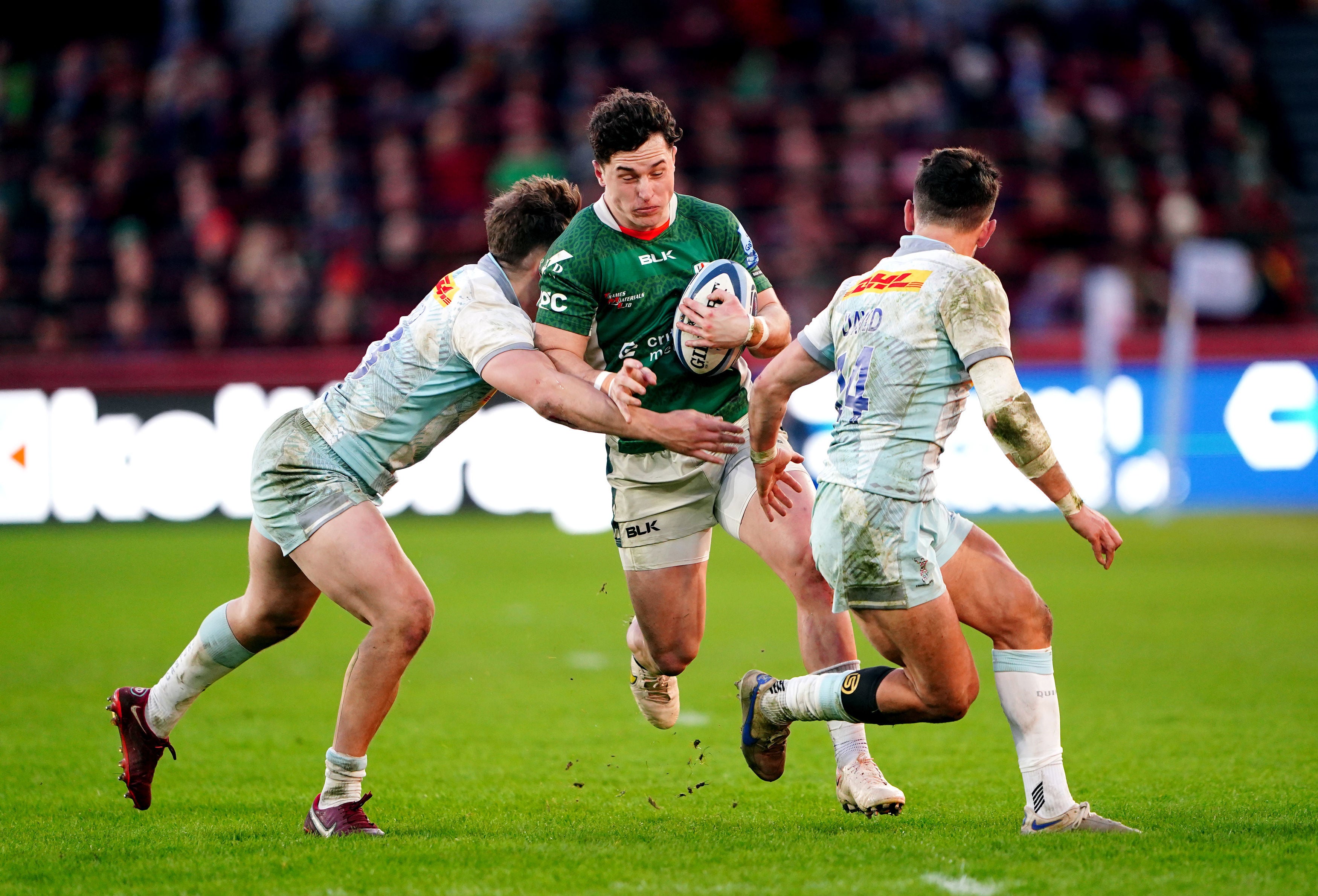 London Irish's Henry Arundell (centre) is tackled