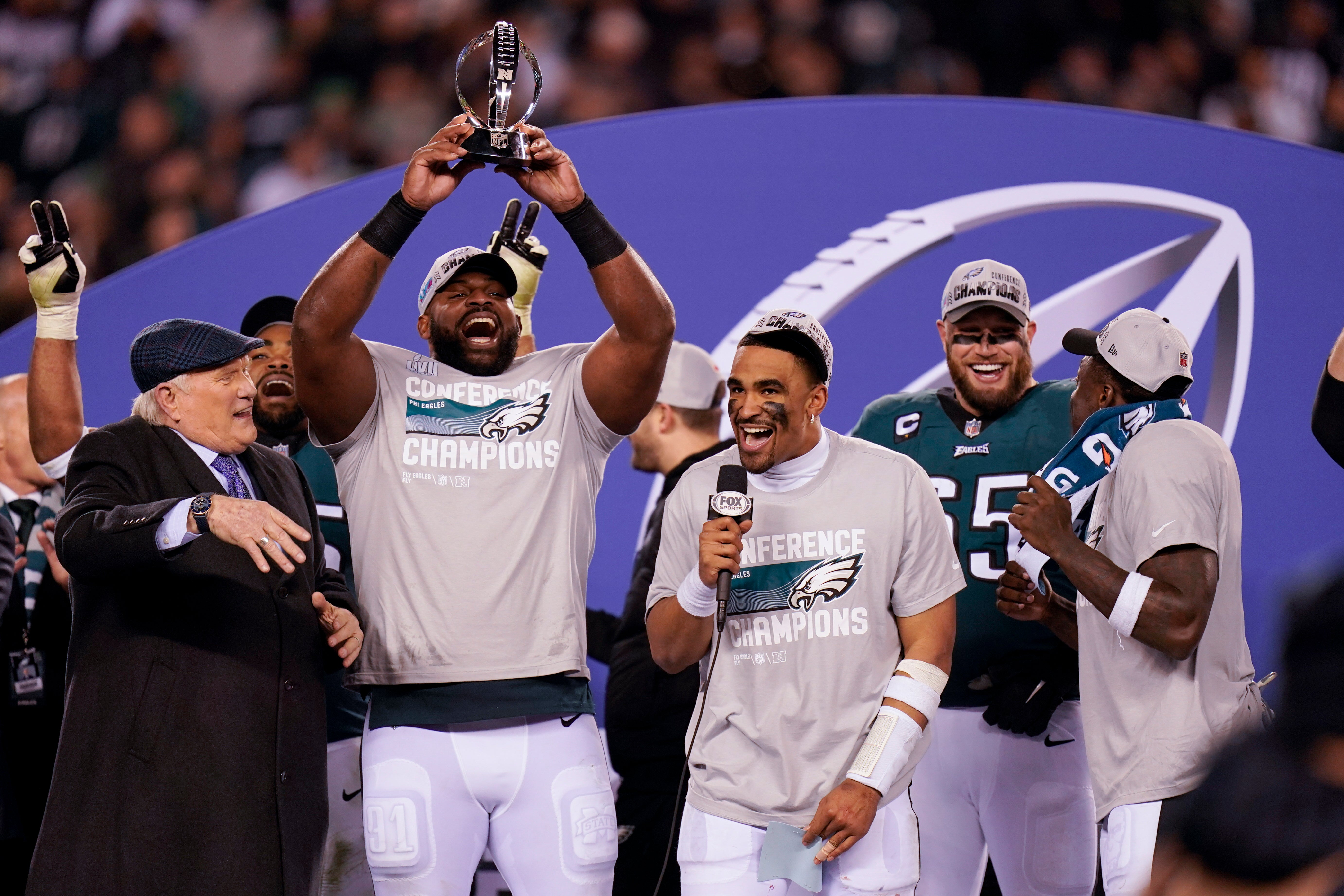 Philadelphia Eagles players celebrate the team’s win over the 49ers on Sunday