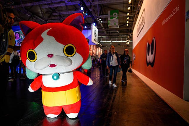 <p>A Jibanyan stands in front of the Nintendo stand at the Gamescom 2016 gaming trade fair during the media day on 17 August 2016 in Cologne, Germany</p>