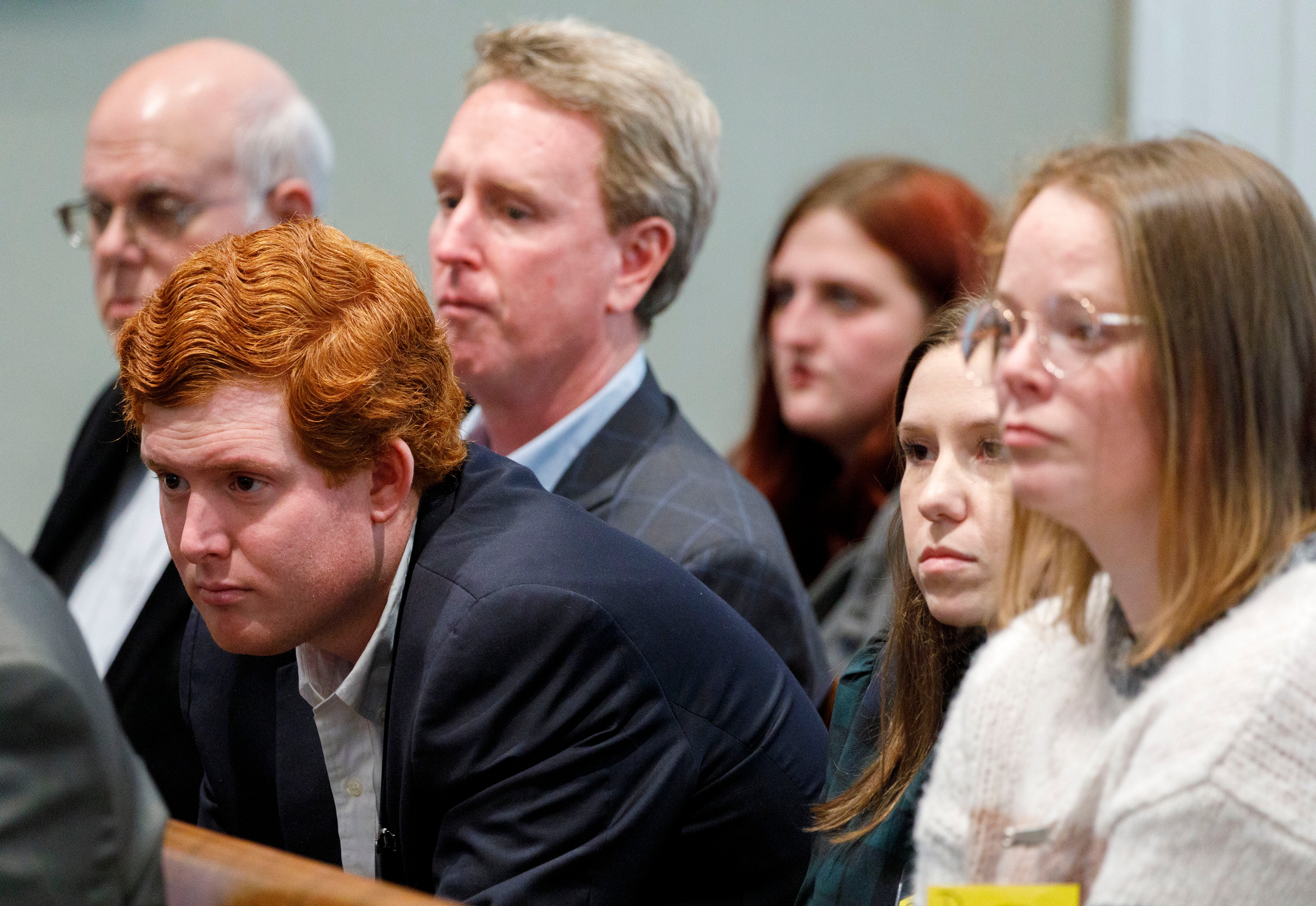 Members of the Murdaugh family, including his son Buster Murdaugh in centre, at the murder trial