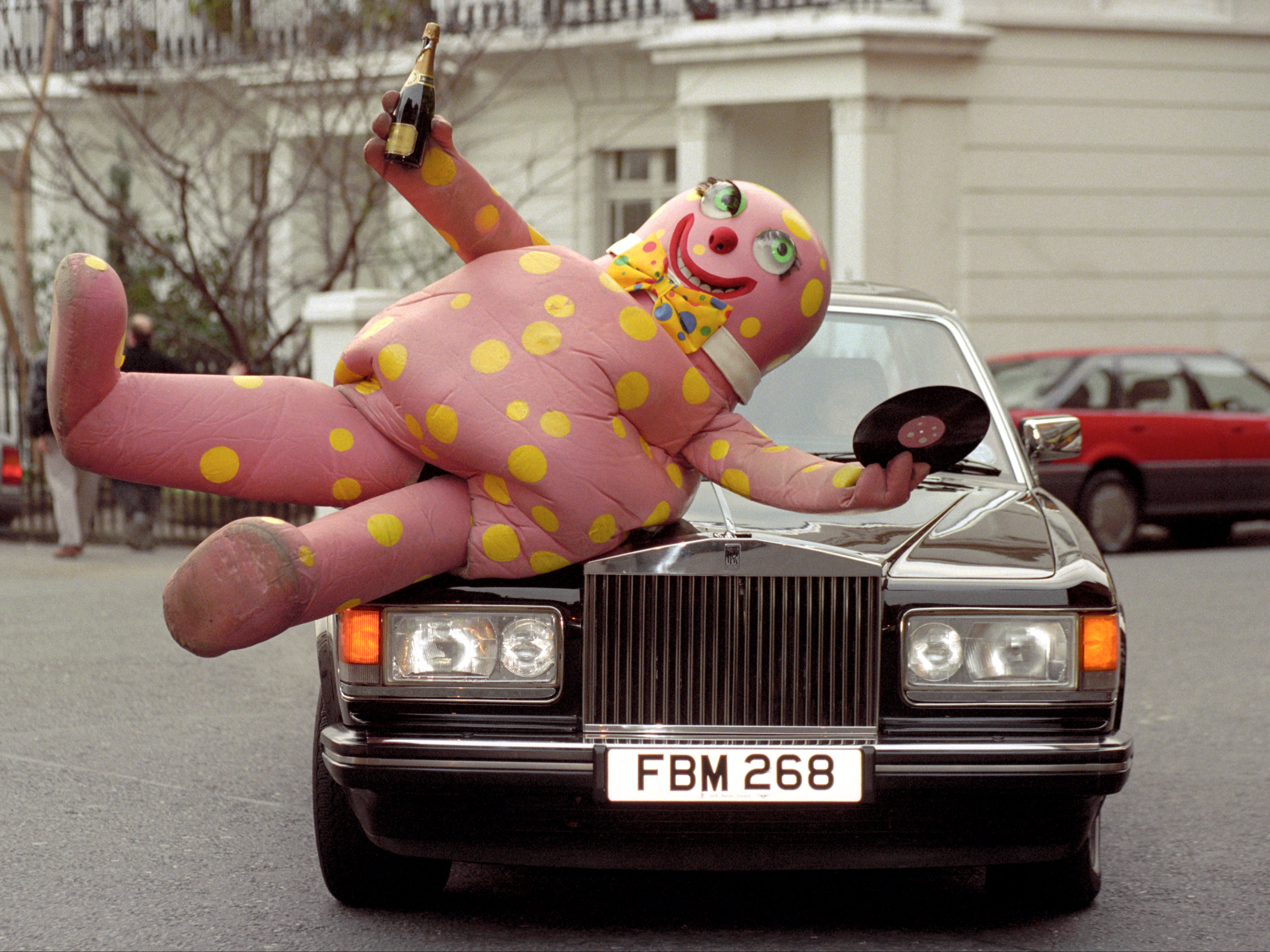 An auction for an original Mr Blobby costume has played out in a characteristically chaotic fashion