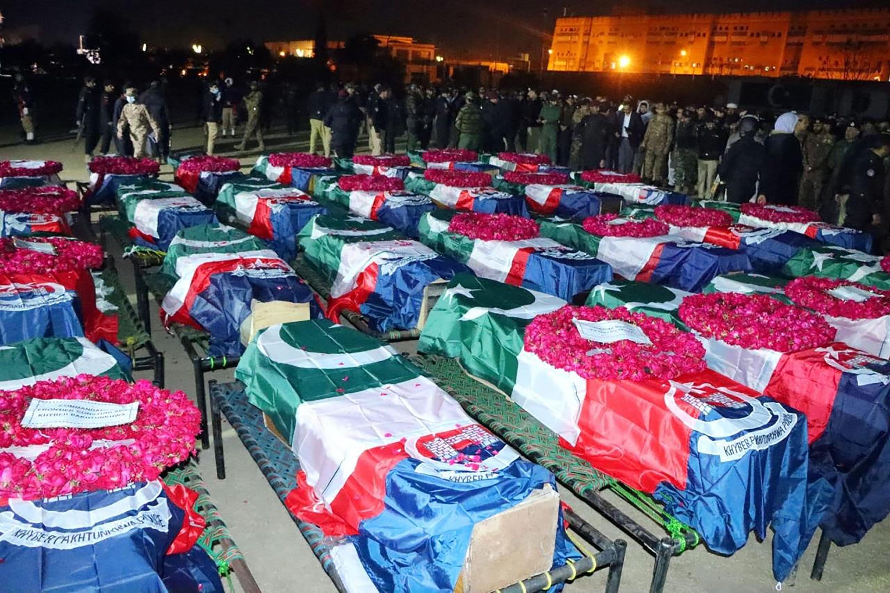 Mass funeral of officers killed in Peshawar mosque bombing