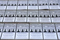 Missing person posters left outside Home Office in protest at asylum hotels scandal 