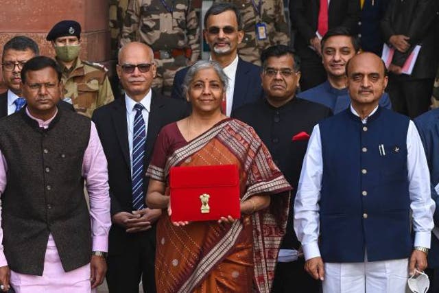 <p>File: India’s finance minister Nirmala Sitharaman eaves the ministry of finance to present the annual budget at the parliament in New Delhi on 1 February 2022</p>