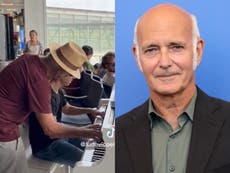 Ludovico Einaudi stuns fan by joining him on the piano at an airport