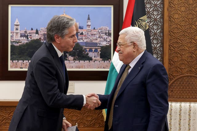 <p>Palestinian president Mahmoud Abbas and US secretary of state Antony Blinken shake hands in Ramallah on Tuesday</p>