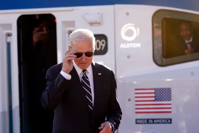<p>President Joe Biden puts on his sunglasses after speaking about infrastructure at the Baltimore and Potomac Tunnel North Portal in Baltimore, Monday, Jan. 30, 2023.</p>