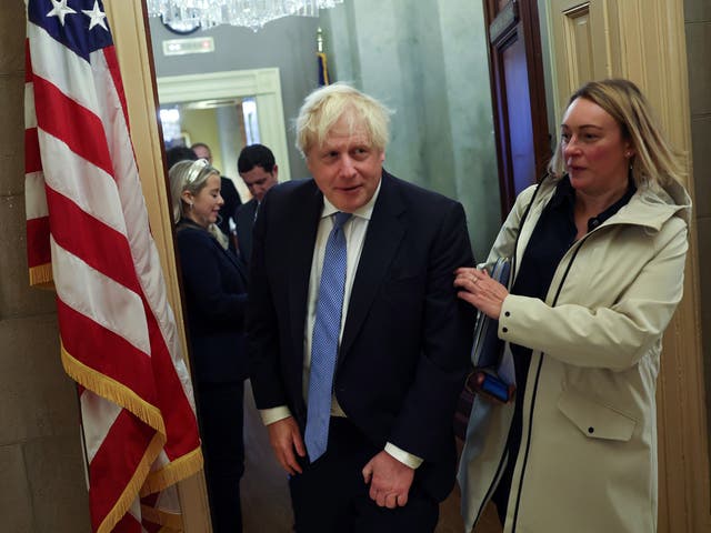 <p>Boris Johnson leaves a meeting at US Senate Minority Leader Mitch McConnell's (R-KY) office at the US Capitol on 31 January 2023 in Washington, DC</p>