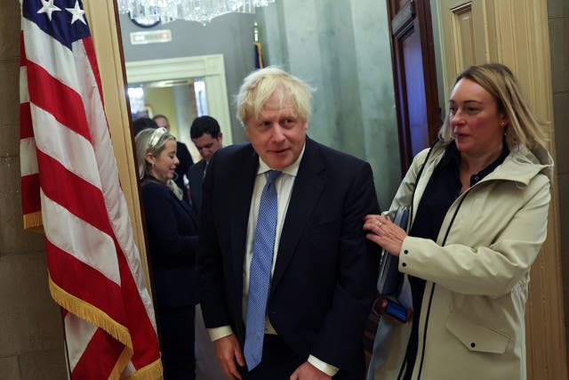 <p>Boris Johnson leaves a meeting at US Senate Minority Leader Mitch McConnell's (R-KY) office at the US Capitol on 31 January 2023 in Washington, DC</p>