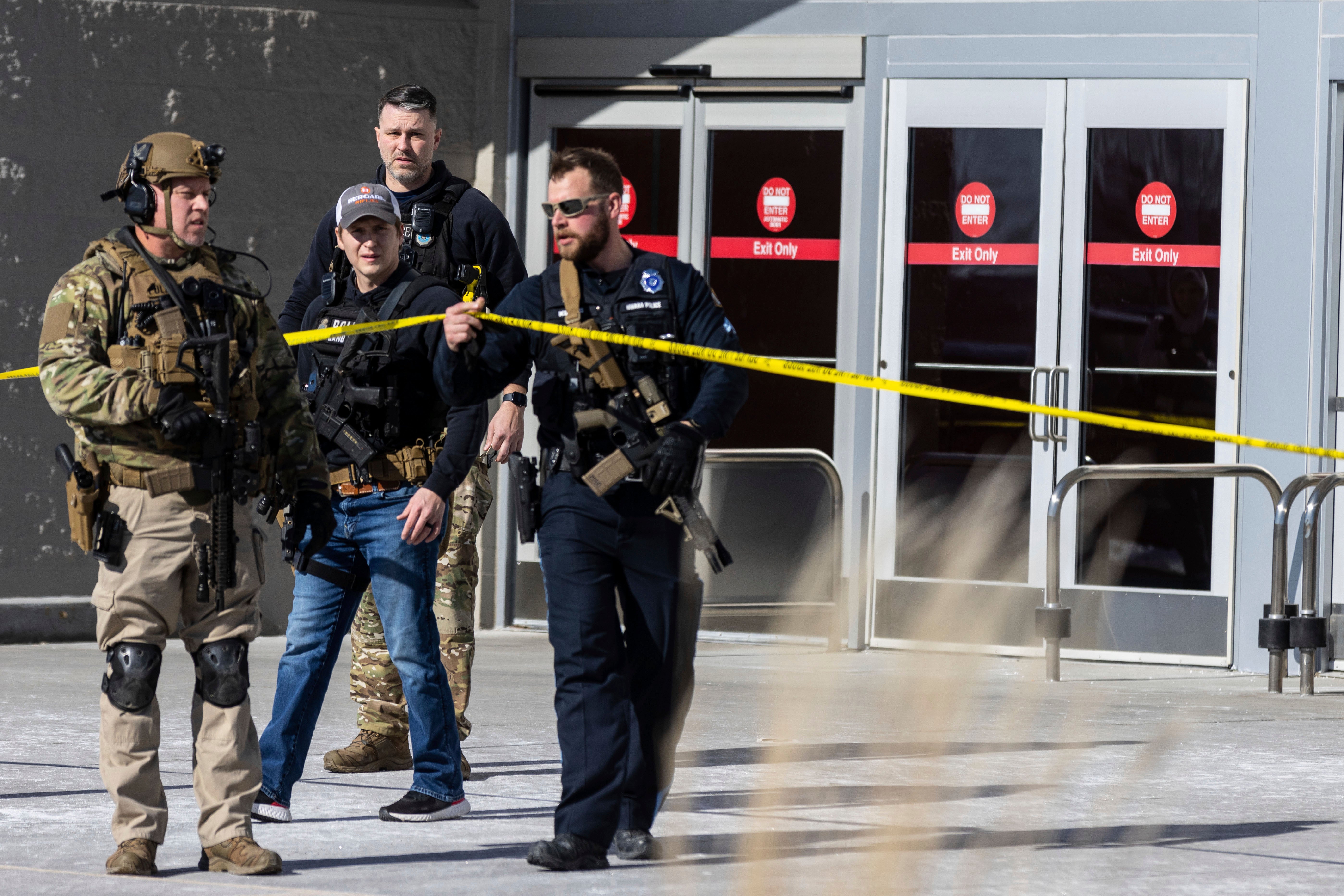 Law enforcement officers are pictured at the scene of a reported shooting at a Target store in Omaha