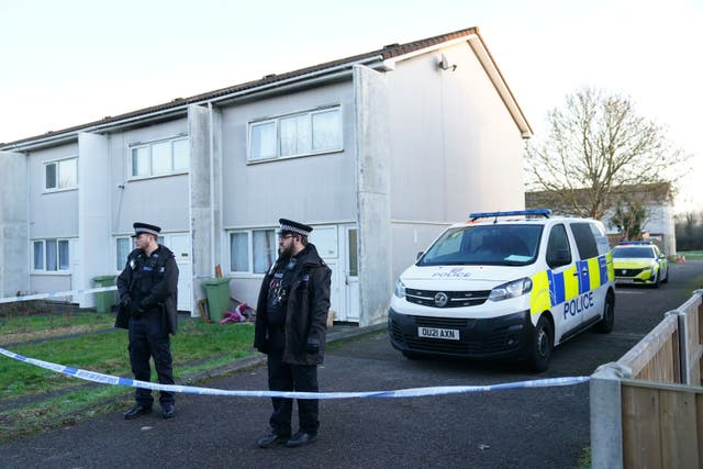 Police at the scene on Broadlands, Netherfield, Milton Keynes, Buckinghamshire, where a four-year-old girl died in a dog attack (Joe Giddens/PA)