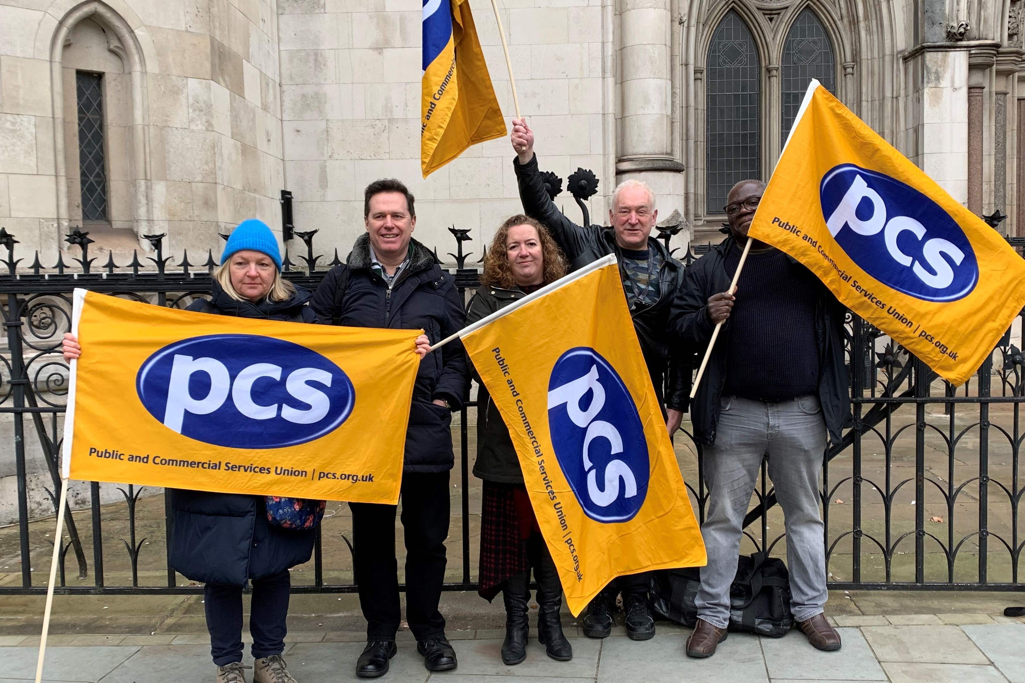 File photo: Fran Heathcote, president of the Public and Commercial Services (PCS) union (centre)
