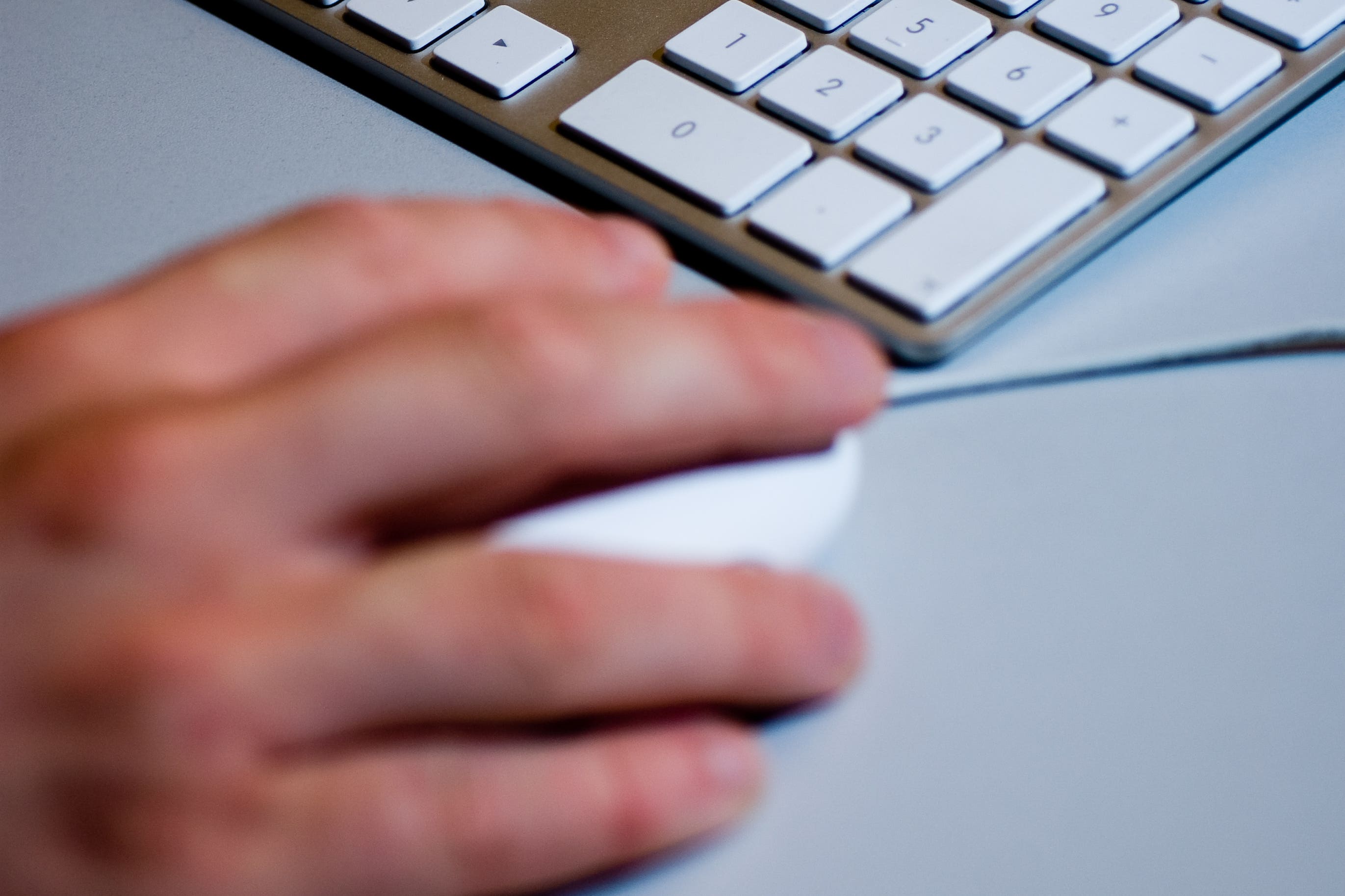 A computer mouse and keyboard (Adam Peck/PA)