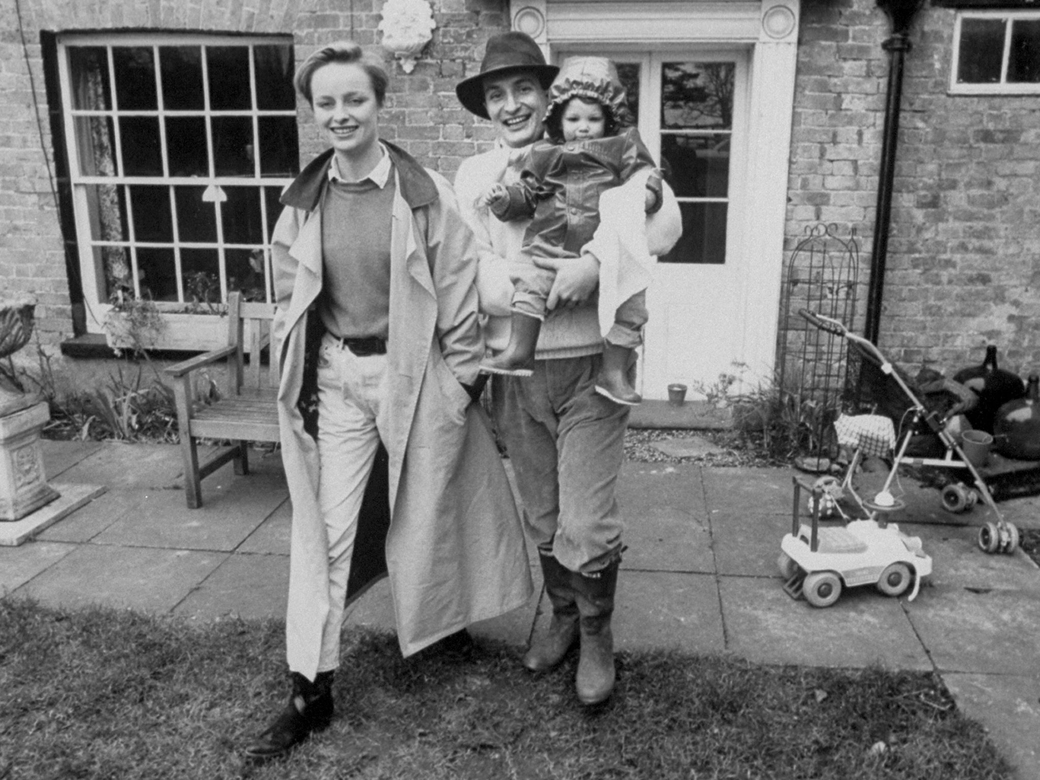 Kit Hesketh-Harvey outside the family home in Norfolk with then-wife Katie Rabett