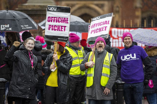 Professor John Barry (second right) with colleagues and supporters on the University and College Union and Unite union picket line at Queen’s University Belfast. (Liam McBurney/PA)