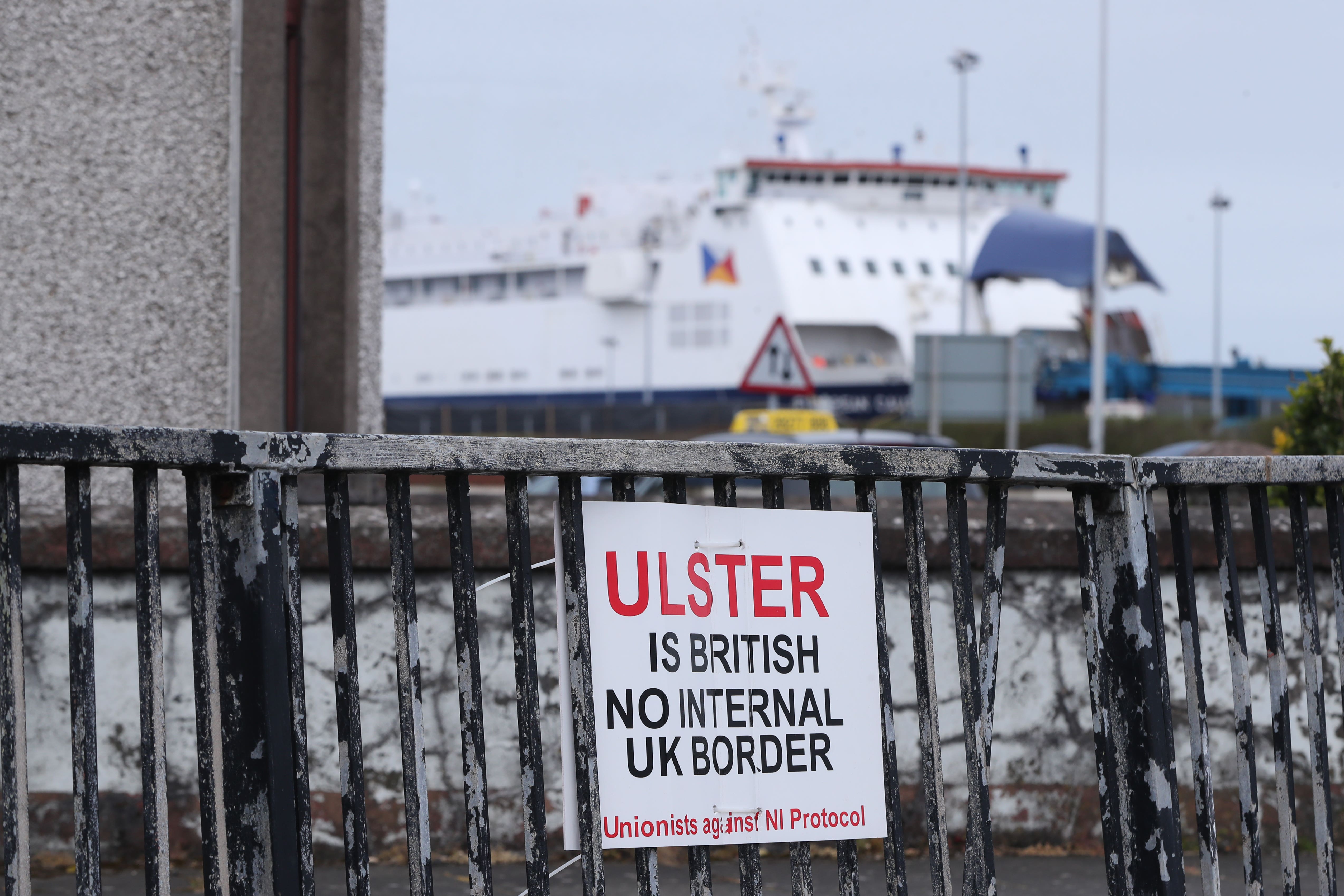 A sign protesting against the Northern Ireland Protocol in Larne Harbour, Northern Ireland (Niall Carson/PA)