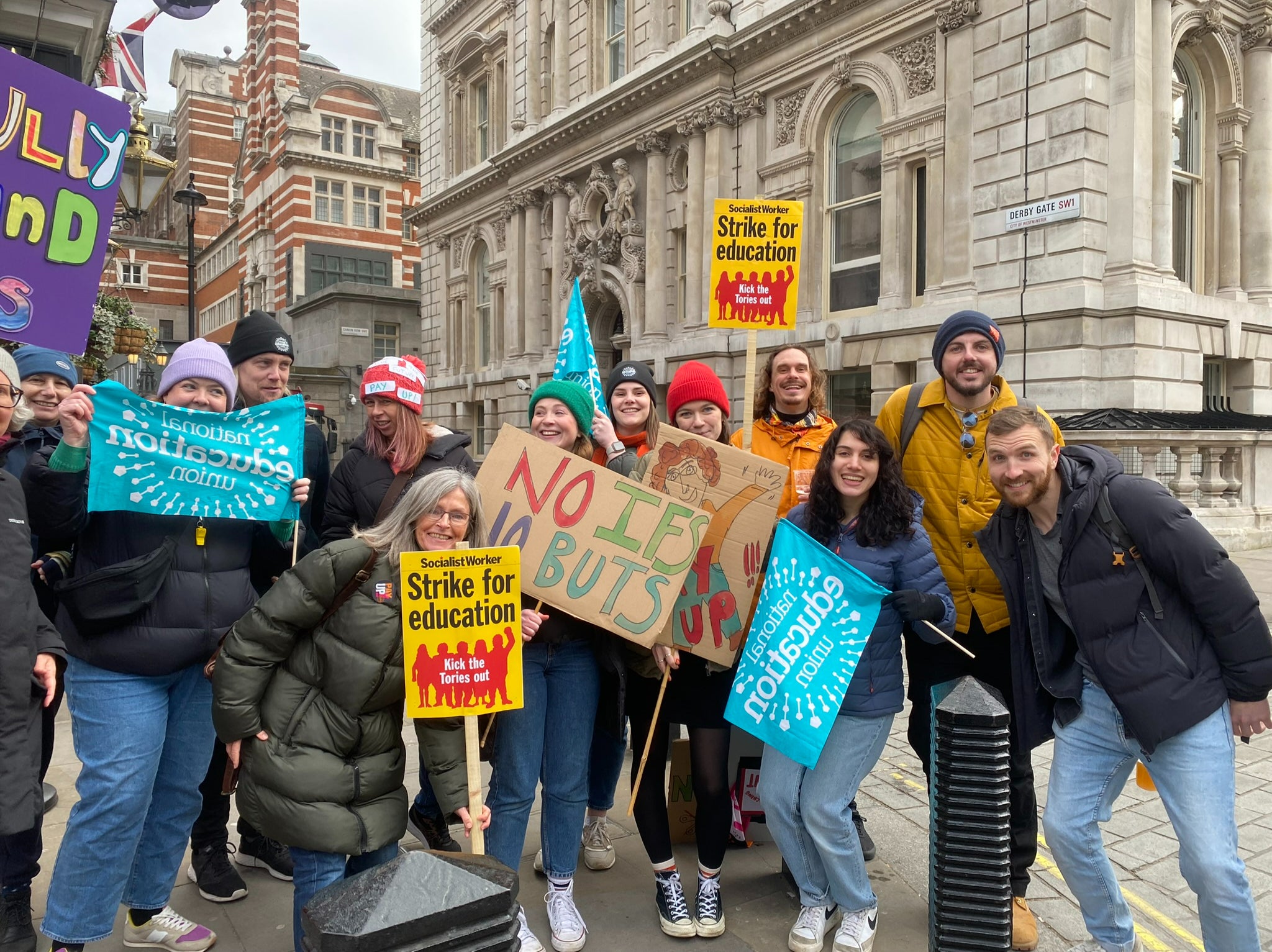 Teaching staff and members of the public showing their support in Westminister, London