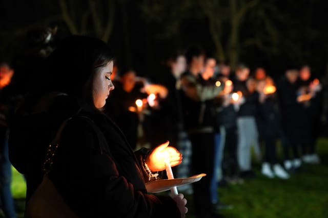 A vigil is held at Grand Union Vineyard Church, Netherfield Campus, in Milton Keynes, Buckinghamshire, in memory of a four-year-old girl who died after a dog attack. (Joe Giddens/ PA)