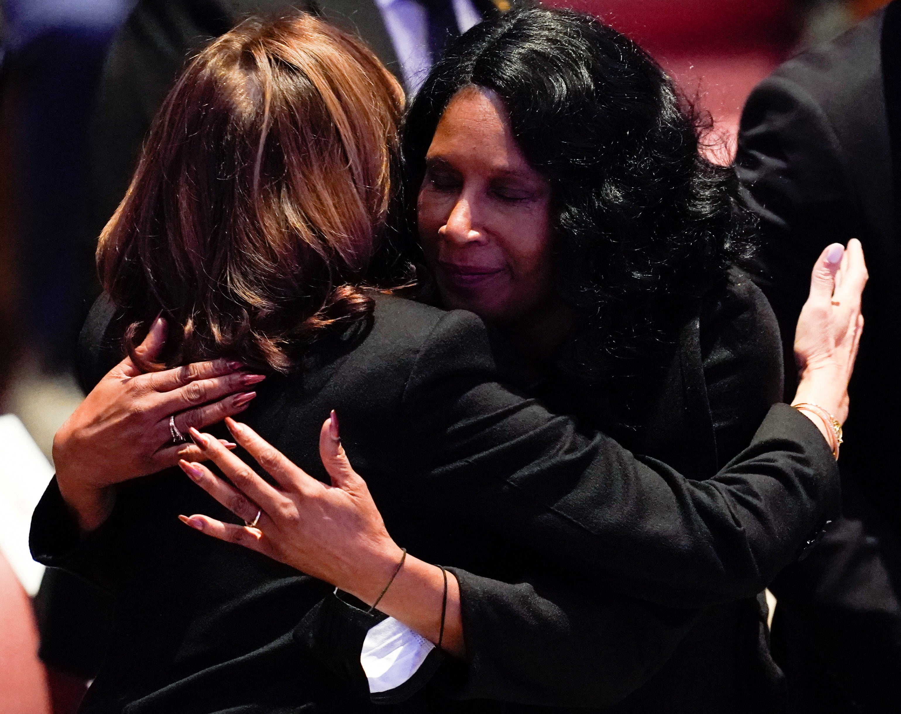 Kamala Harris, left, embraces RowVaughn Wells, the mother of Tyre Nichols, during a funeral for her son