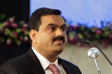Adani Group abandons share offer in escalating crisis triggered by fraud claims that routs wealth