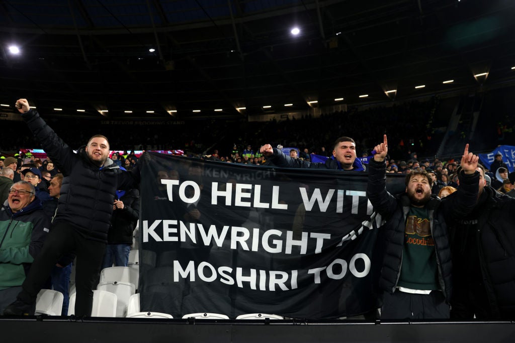 Everton fans hold a banner aimed at the club’s owners as discontent mounts