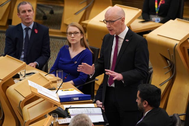Deputy First Minister John Swinney urged MSPs to back the budget (Andrew Milligan/PA)