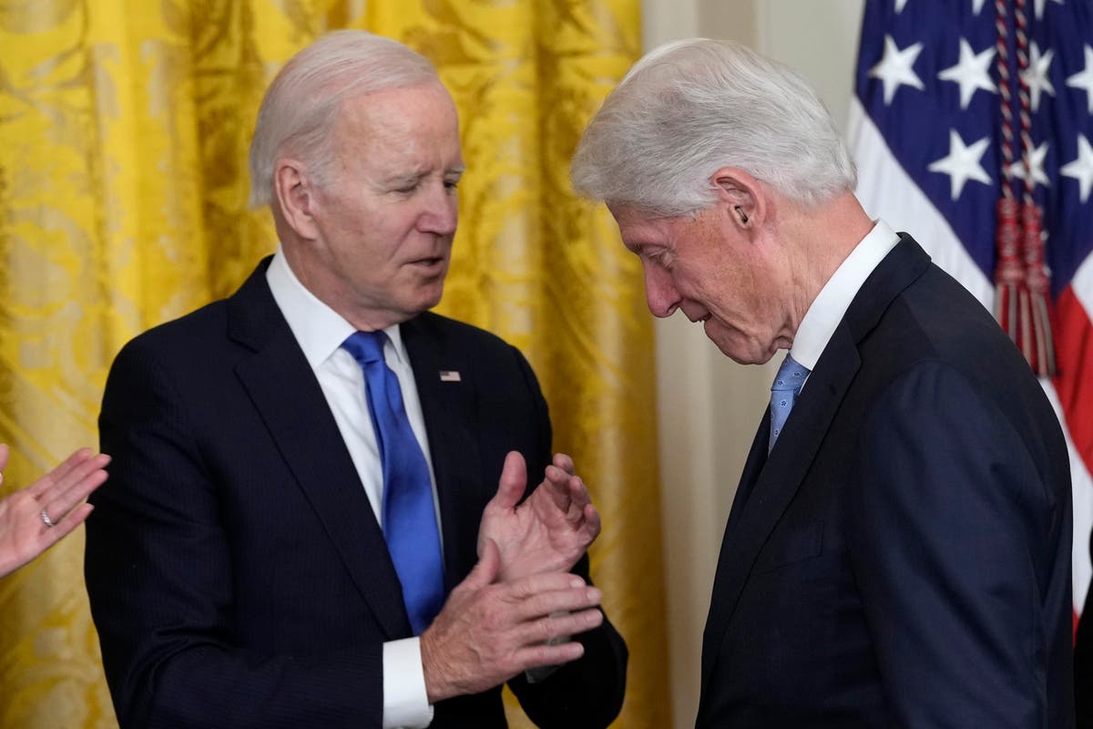 Biden and Bill Clinton enjoy light moments as 42nd president returns to White House to celebrate family leave anniversary