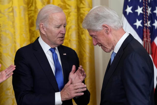 <p>President Joe Biden talks with former President Bill Clinton during an event in the East Room of the White House in Washington, Thursday, Feb. 2, 2023, to mark the 30thÂ Anniversary of the Family and Medical Leave Act. (AP Photo/Susan Walsh)</p>