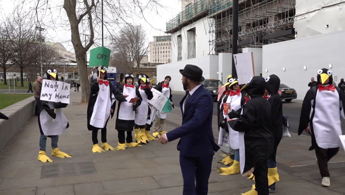‘Penguins’ protest outside Shell’s London headquarters after record profits announced