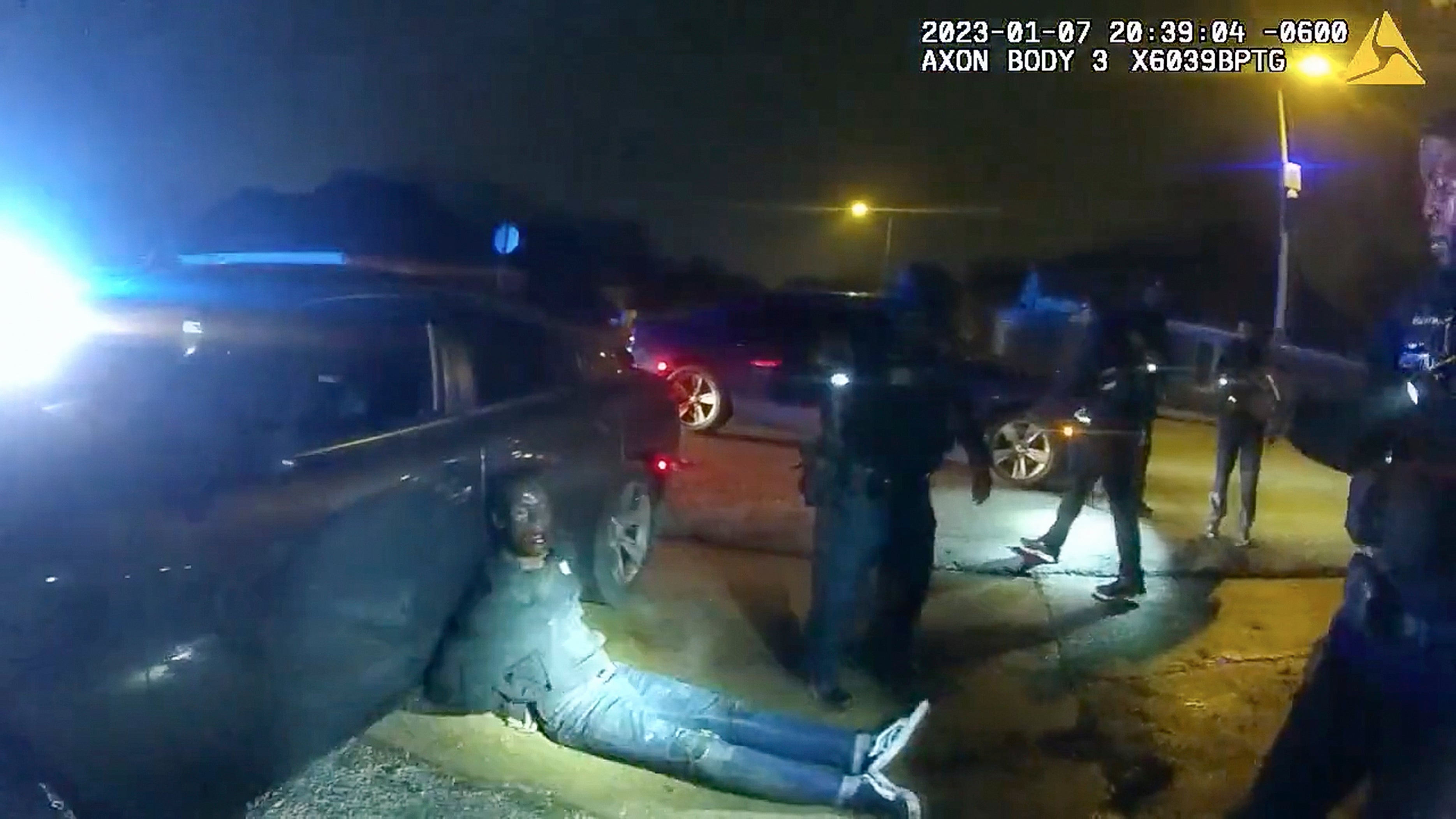 In footage released by Memphis PD, Tyre Nichols lies slumped on the ground after being attacked by five police officers