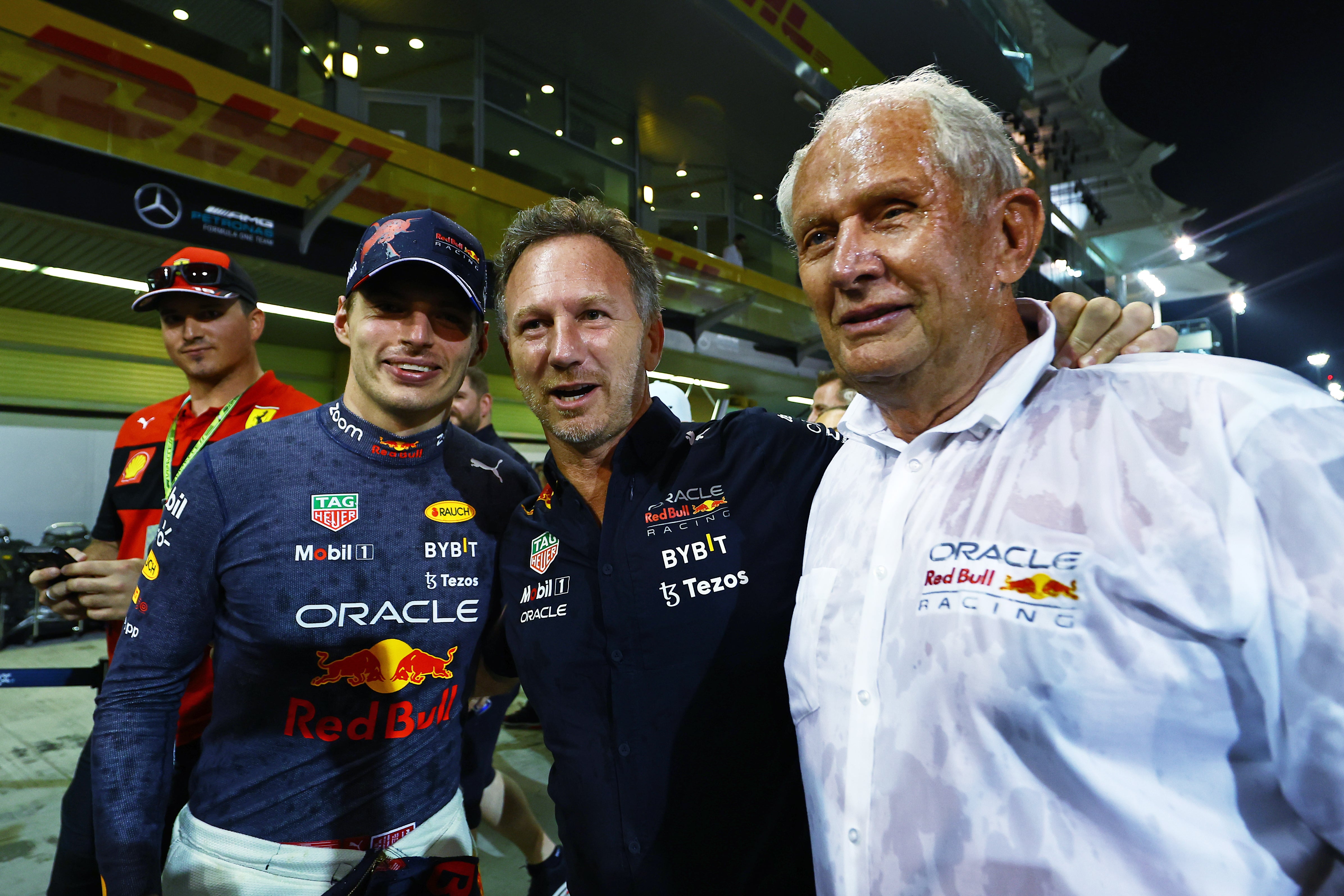 Horner with Verstappen (left) and Helmut Marko (right)