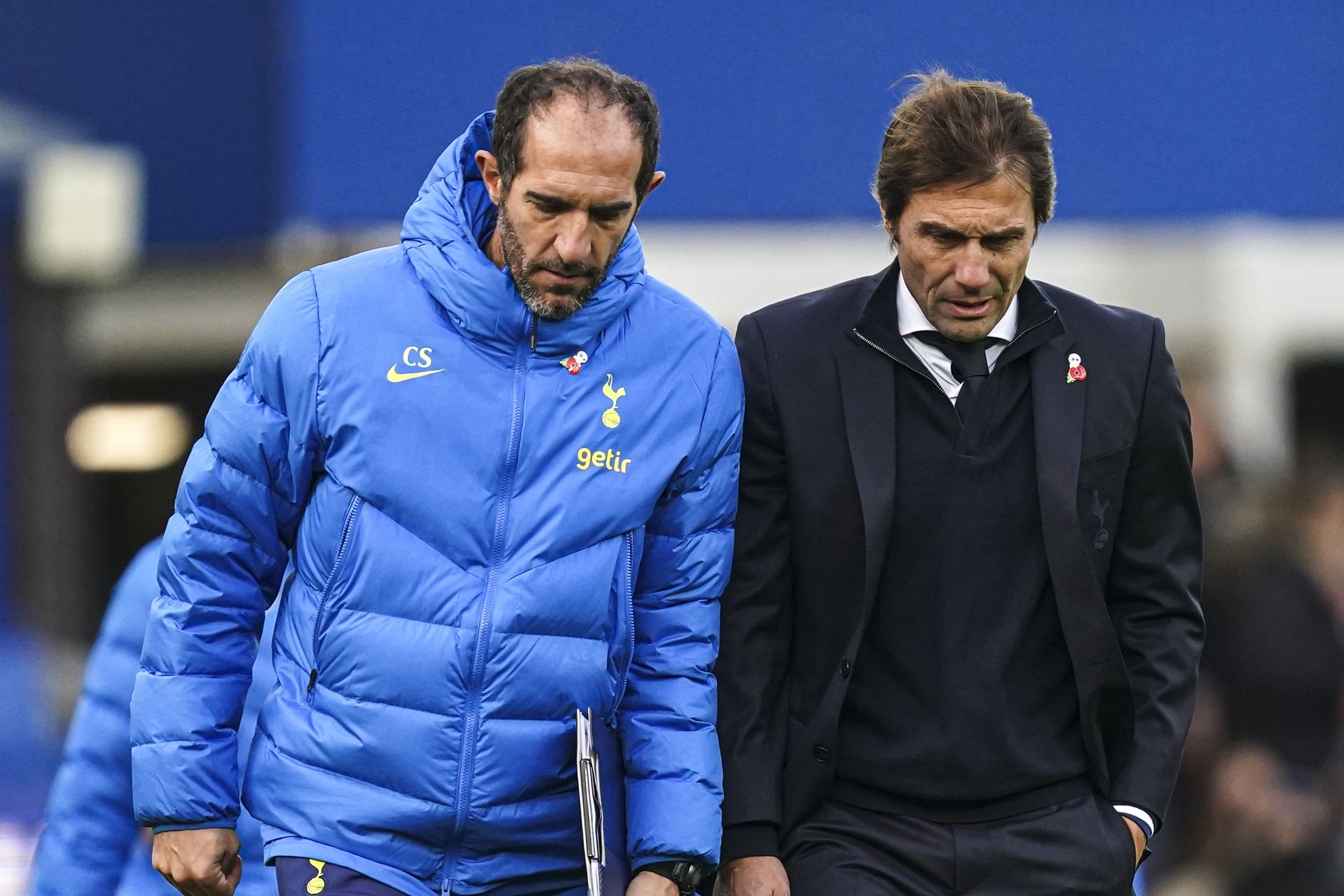 Cristian Stellini, left, has not given up hope of Antonio Conte being on the Tottenham touchline for Sunday’s visit of Manchester City (Martin Rickett/PA)