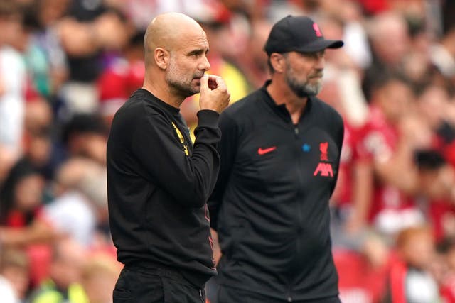 Pep Guardiola (left) and Jurgen Klopp (right) are confused by Chelsea’s levels of spending (joe Giddens/PA)