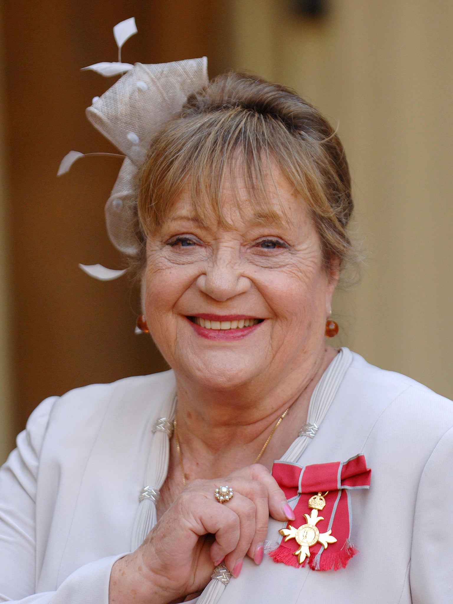 Syms pictured in 2007 after collecting her OBE