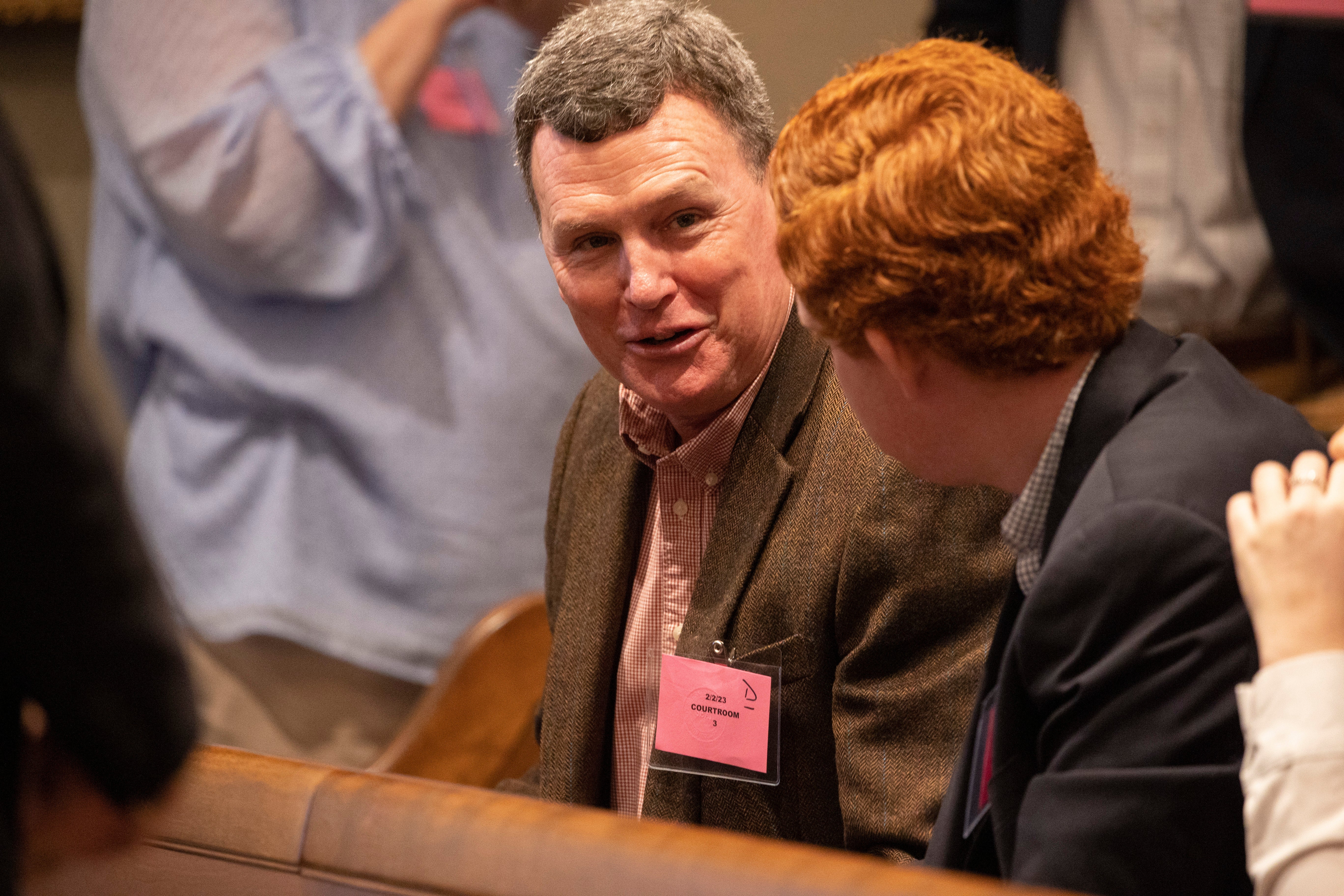 Randy Murdaugh talks with Buster Murdaugh during the double murder trial of Alex Murdaugh – their brother and father