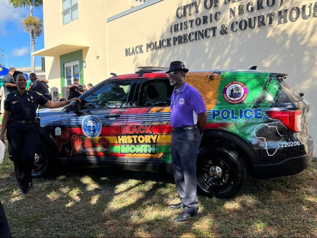 <p>A Miami Police Department cruiser decorated for Black History Month</p>