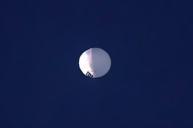 <p>A high altitude balloon floats over Billings, Mont., on Wednesday, Feb. 1, 2023.</p>