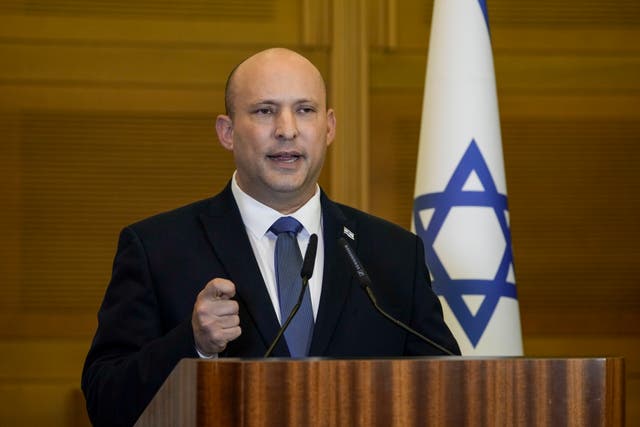 <p>FILE - Israeli Prime Minister Naftali Bennett delivers a statement at the Knesset, Israel’s parliament, in Jerusalem</p>