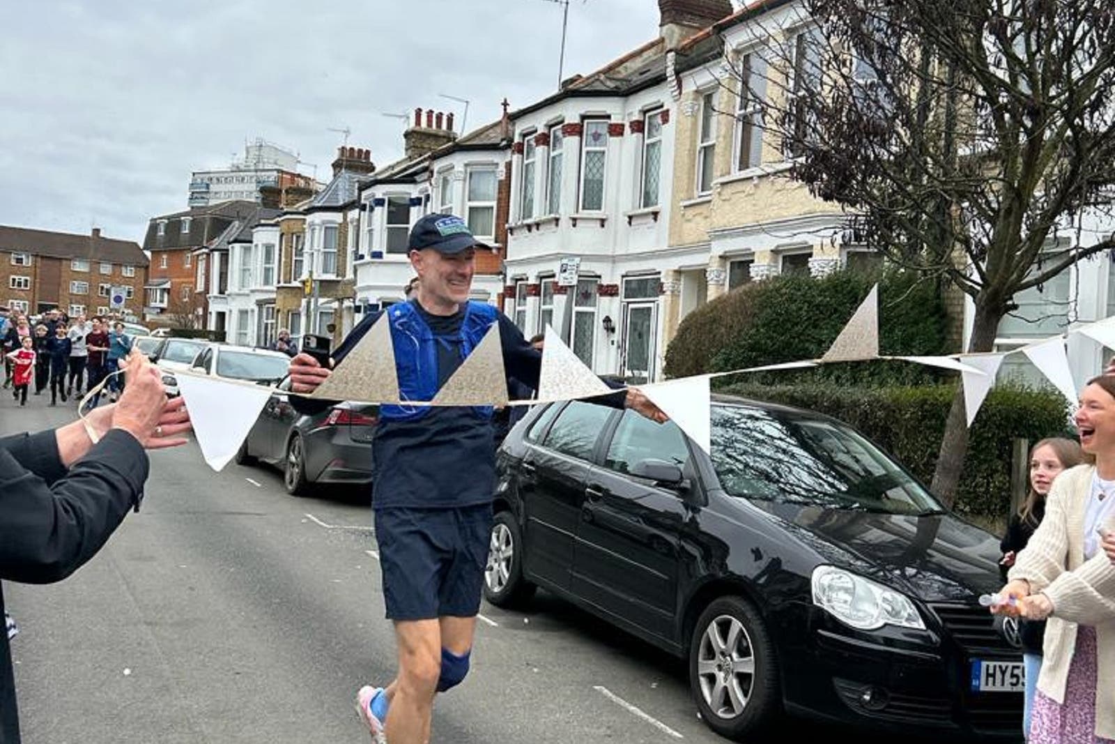 Jamie Austin crossed the finish line on Saturday (Lucy Kavanagh/PA)