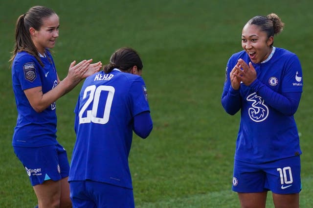 Lauren James, right, celebrates scoring Cheslea’s second goal at Tottenham (Adam Davy/PA)