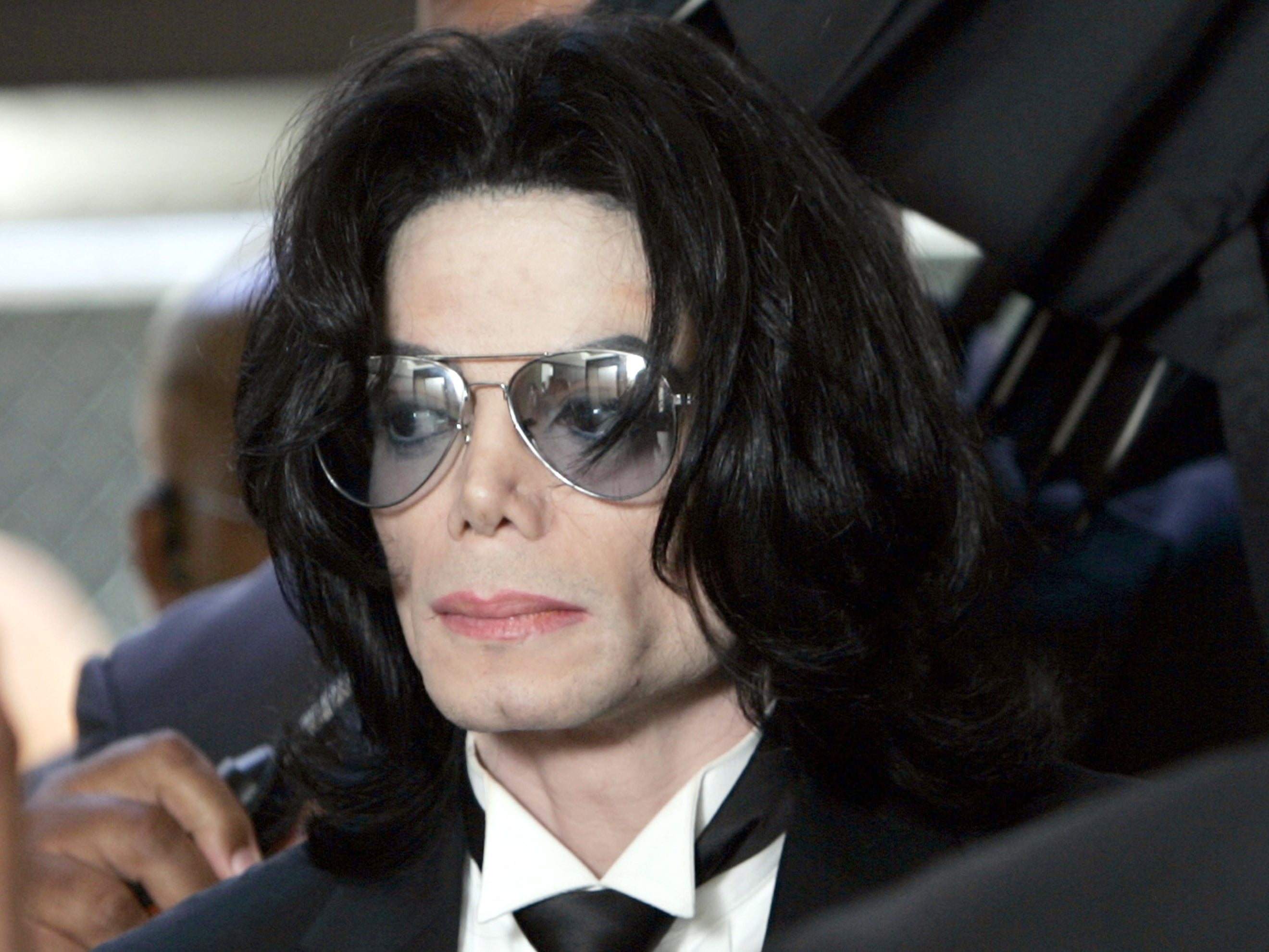 Michael Jackson prepares to enter the Santa Barbara County Superior Court to hear the verdict read in his child molestation case June 13, 2005 in Santa Maria, California
