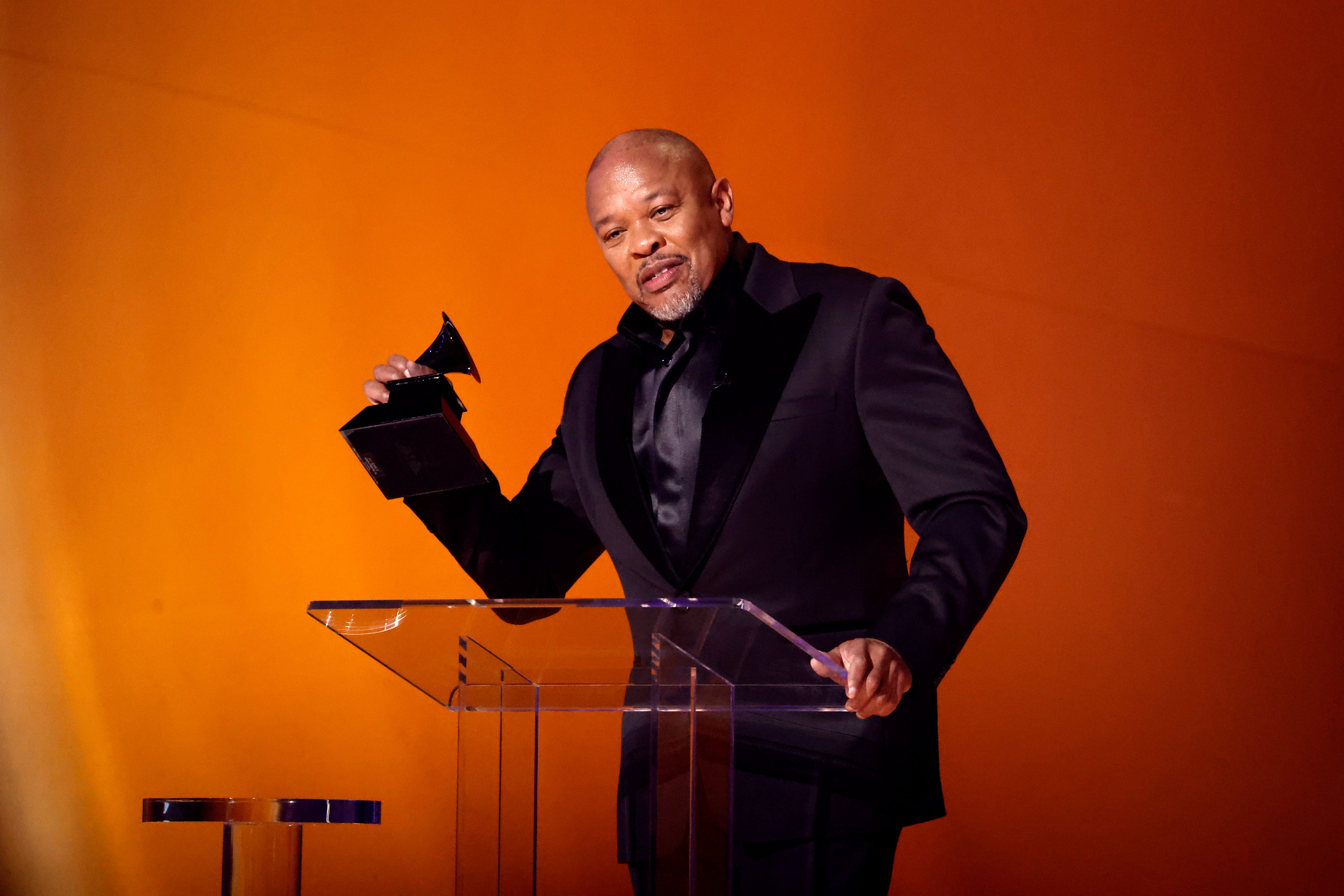 Dr. Dre accepts the Dr. Dre Global Impact Award onstage during the 65th GRAMMY Awards