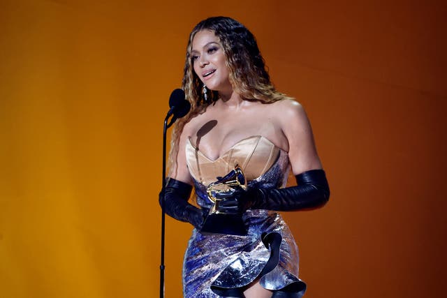 <p>Beyoncé accepting her record-breaking 32nd Grammy Award</p>