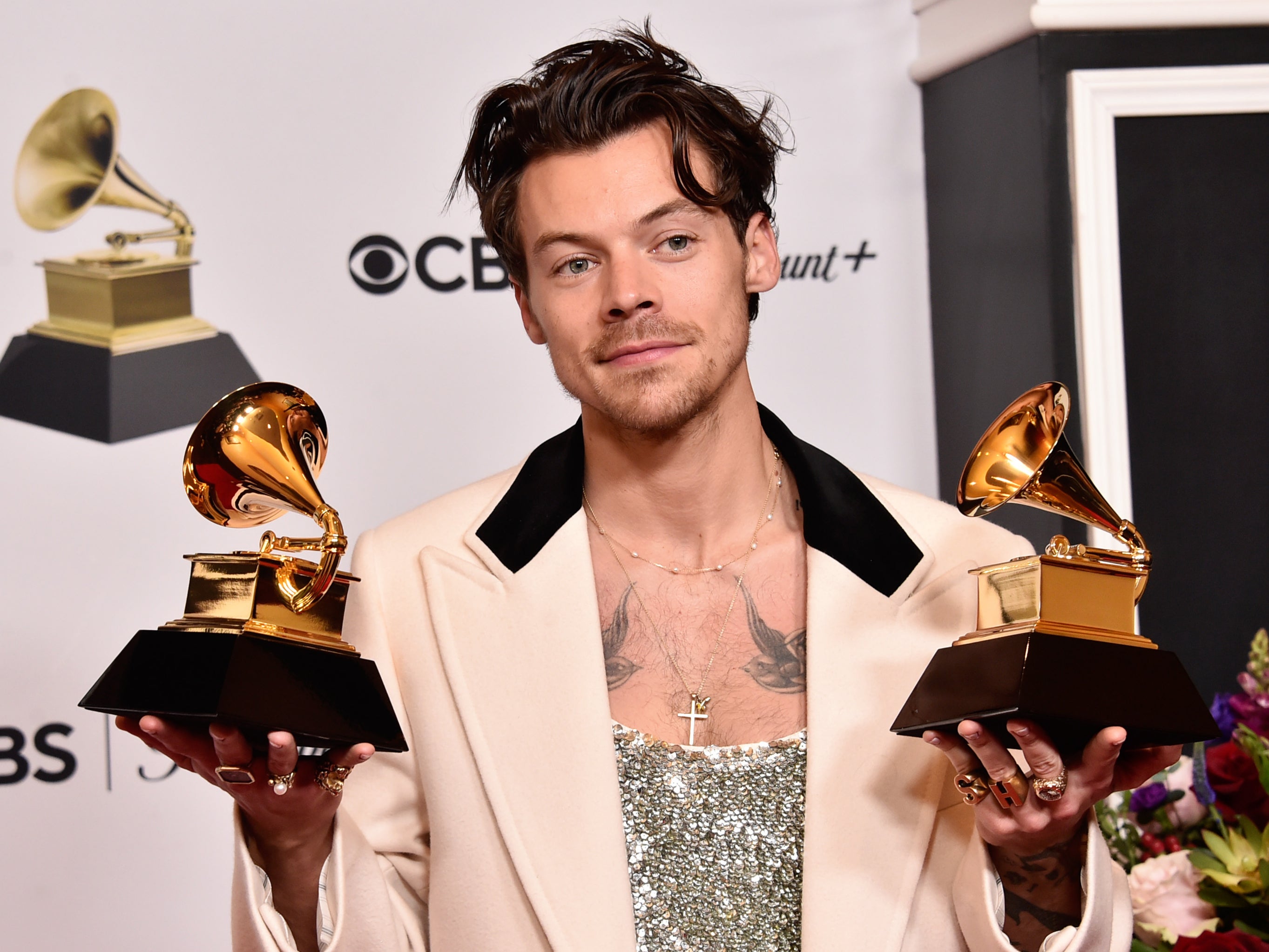Harry Styles posing at the Grammys