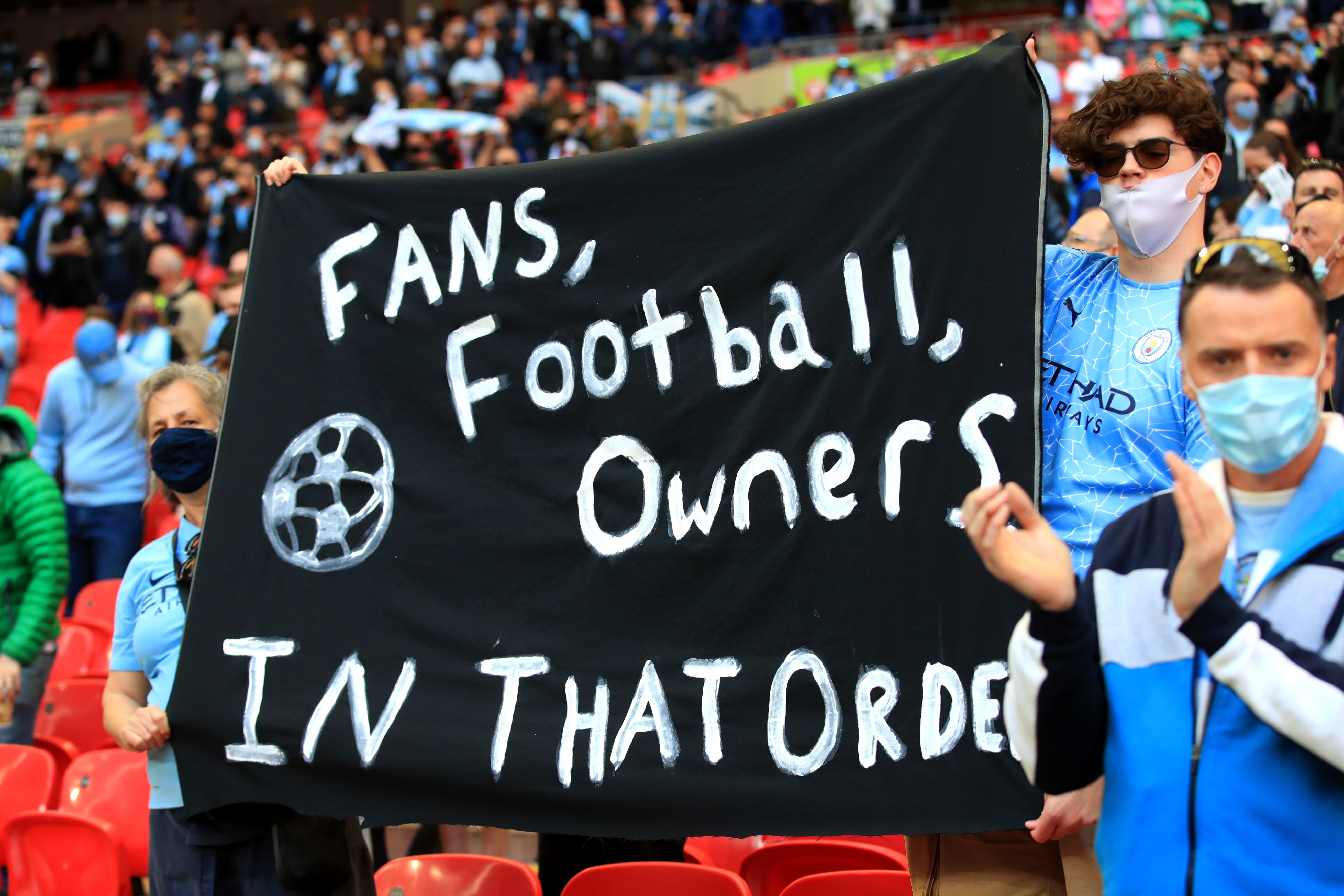 Fans protest (Adam Davy/PA)