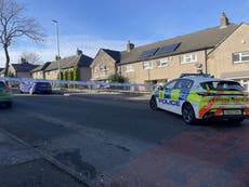 Three children stabbed at home as woman arrested on suspicion of attempted murder