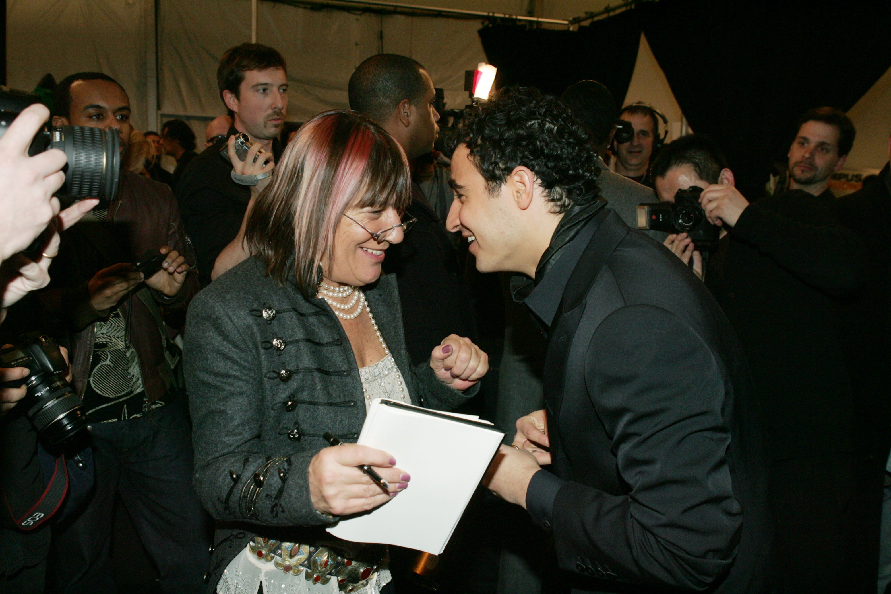 With designer Zac Posen at New York Fashion Week in 2005