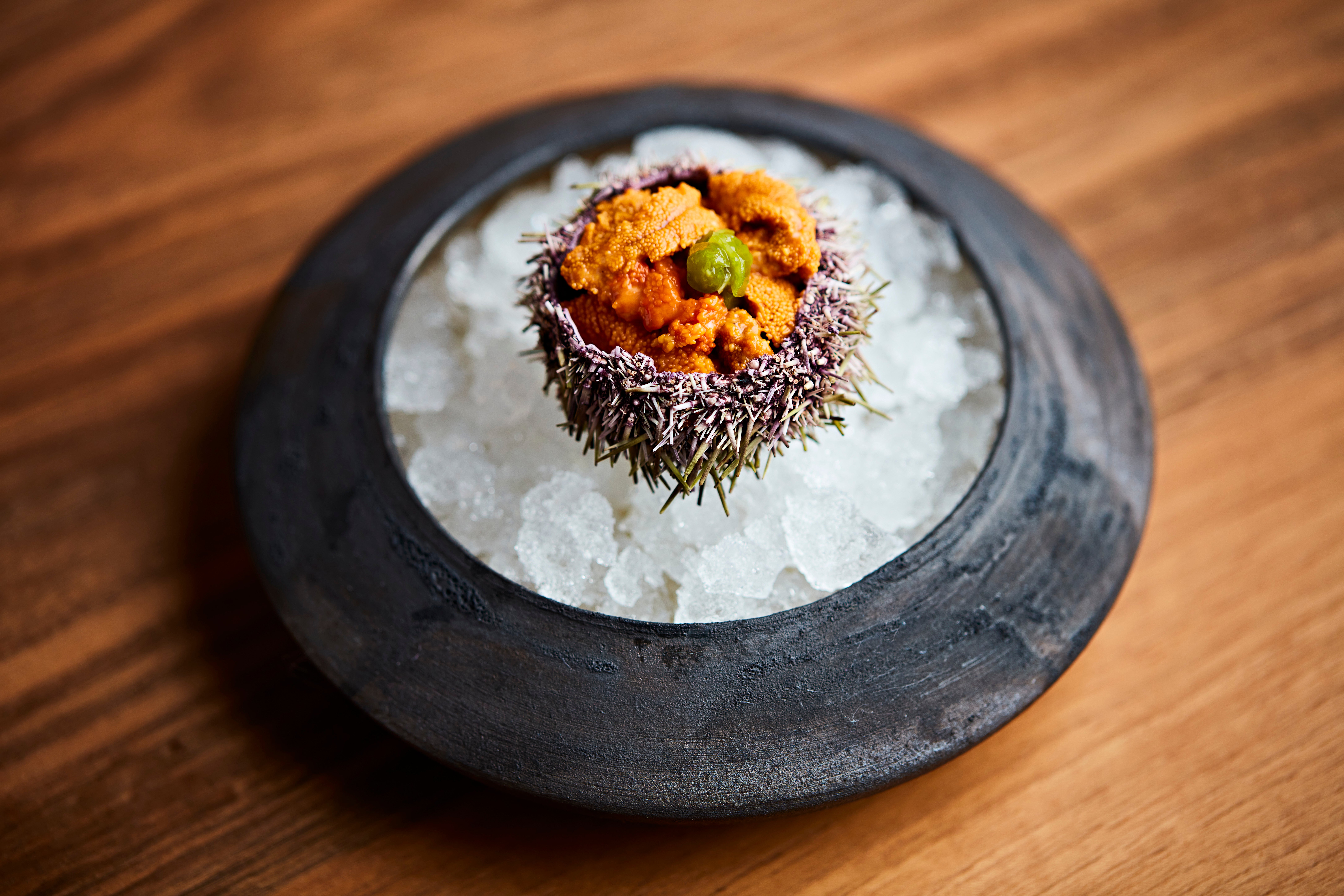 Uni (sea urchin) served raw in its shell at Mayha